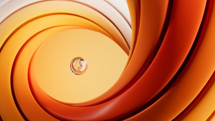 A close up of an orange and white swirl