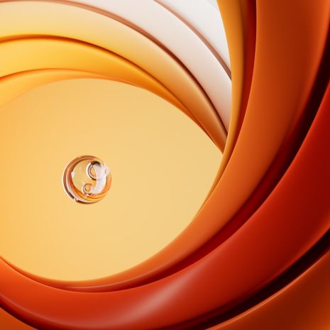 A close up of an orange and white swirl